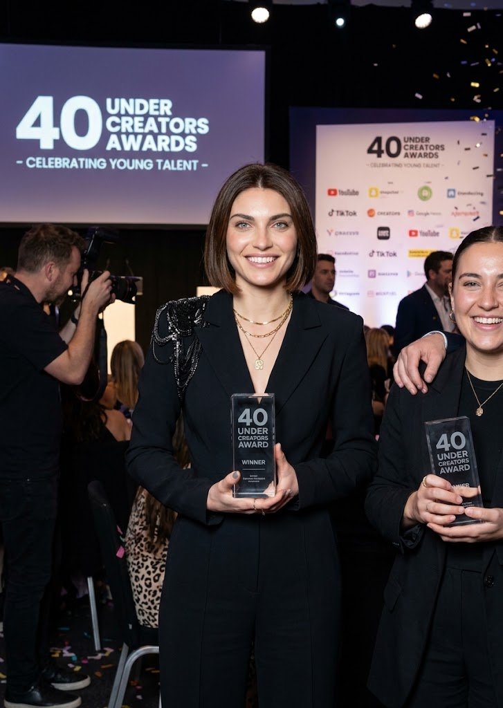 Nica Tasha accepting the Top 40 Under 40 Creators award